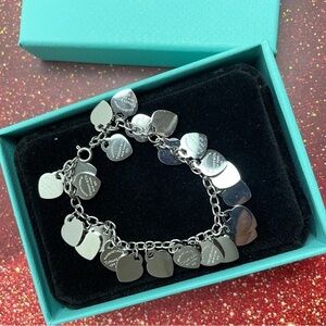 Tiffany & Co. Sterling Silver Heart Charm Bracelet with Multiple Heart Discs